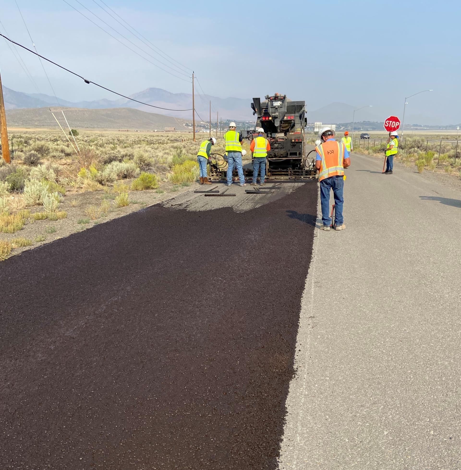 Truck spreads asphalt