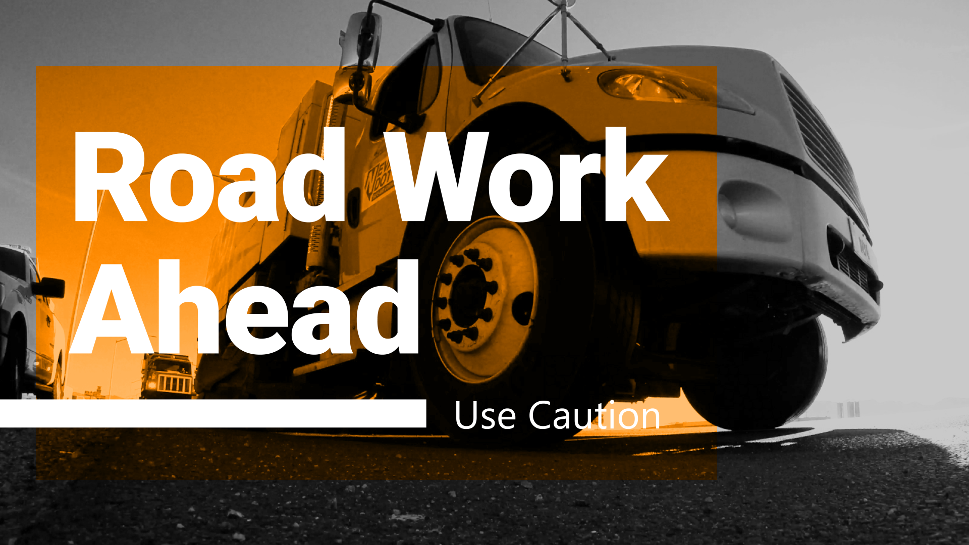 Truck with text, Road Work Ahead