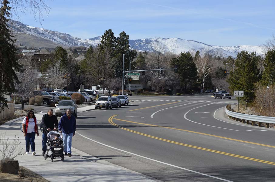 Connect Communities - Family Walking on Sidewalk