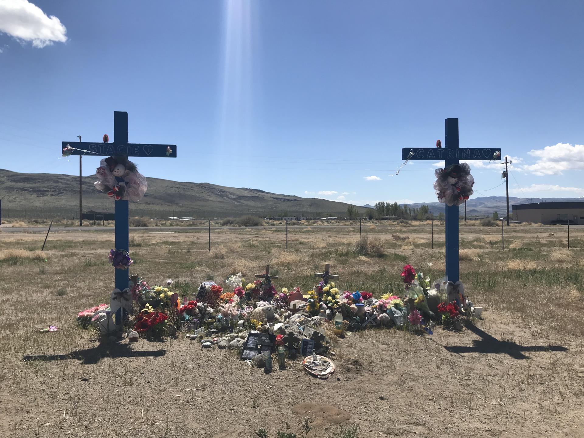 Two roadside memorial crosses